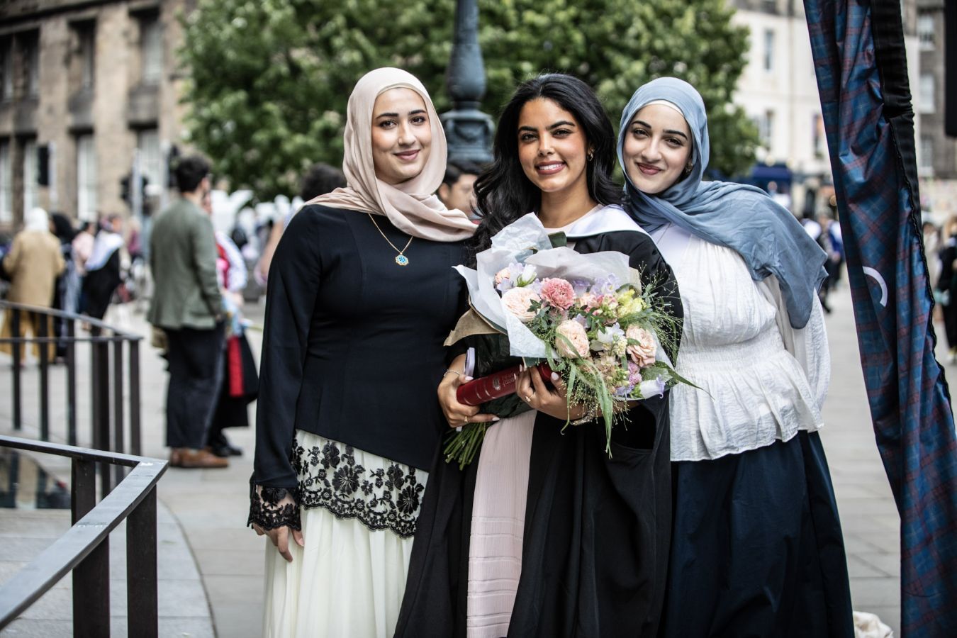 Students celebrating SPS Graduations in Bristo Square