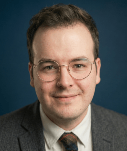 beautiful AI-generated headshot of the very handsome Dr Fraser McMillan