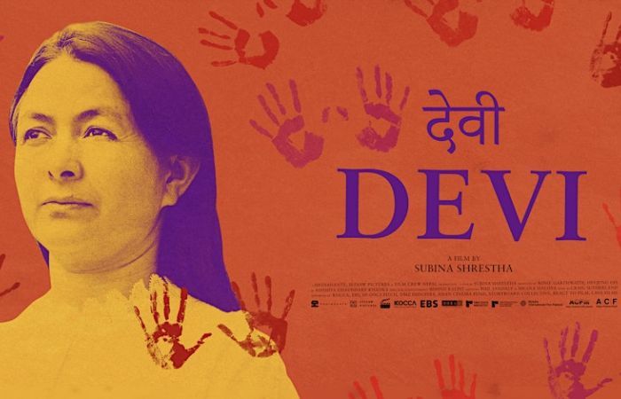 Poster for the film Devi, shows a photo of Devi Khadka on a red background with a design of hand prints.