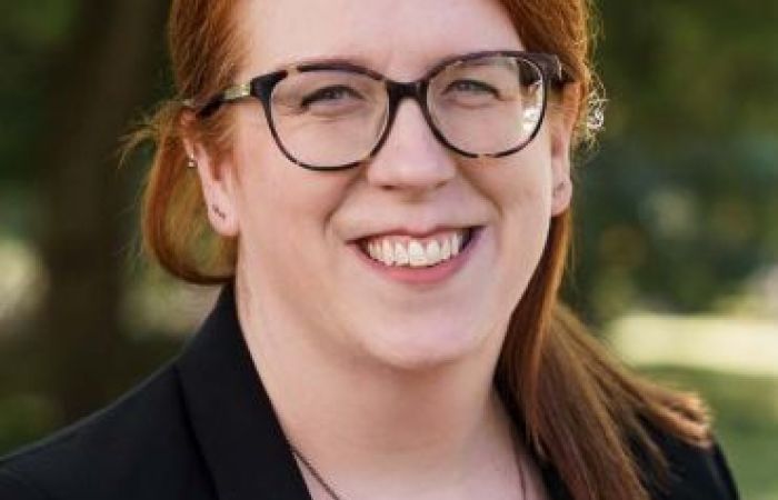 ginger academic with glasses