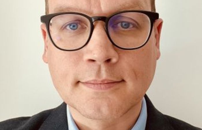 An image of myself in a suit and tie.