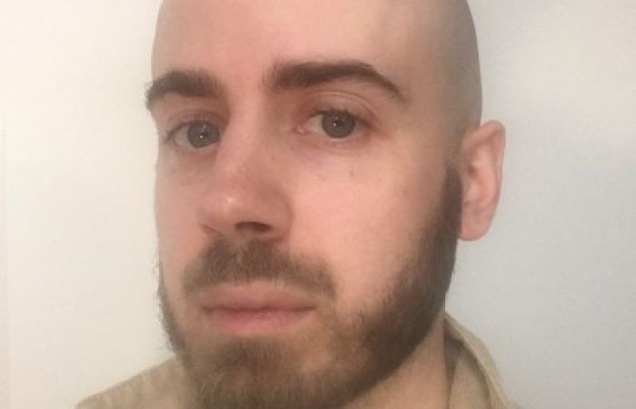 picture of Theo Bourgeron, bald marxist with chestnut beard